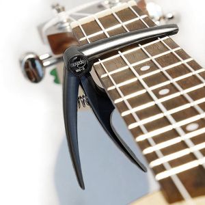 Musedo MC-3 каподастер за укулеле китара 